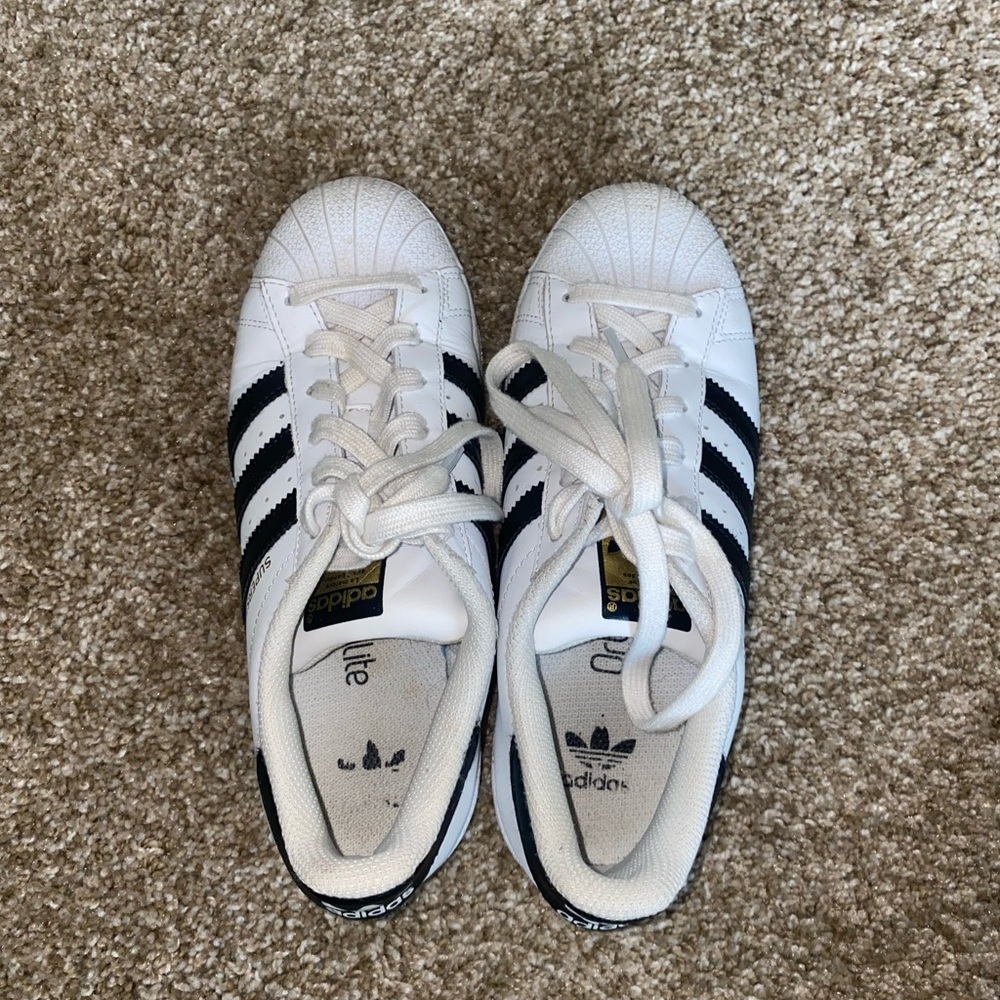 White and Black Adidas All stars